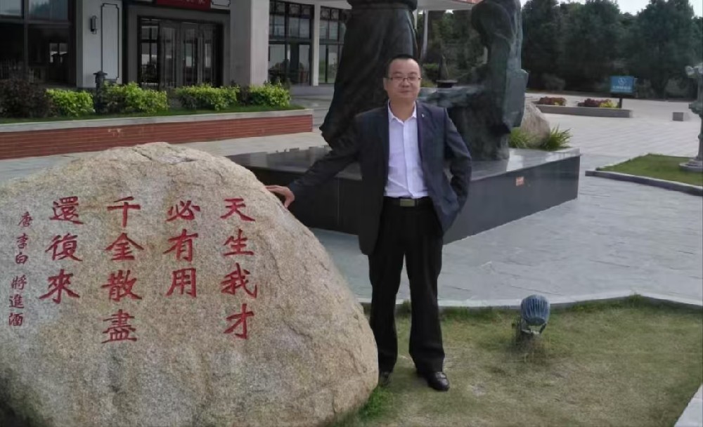 高明付.jpg